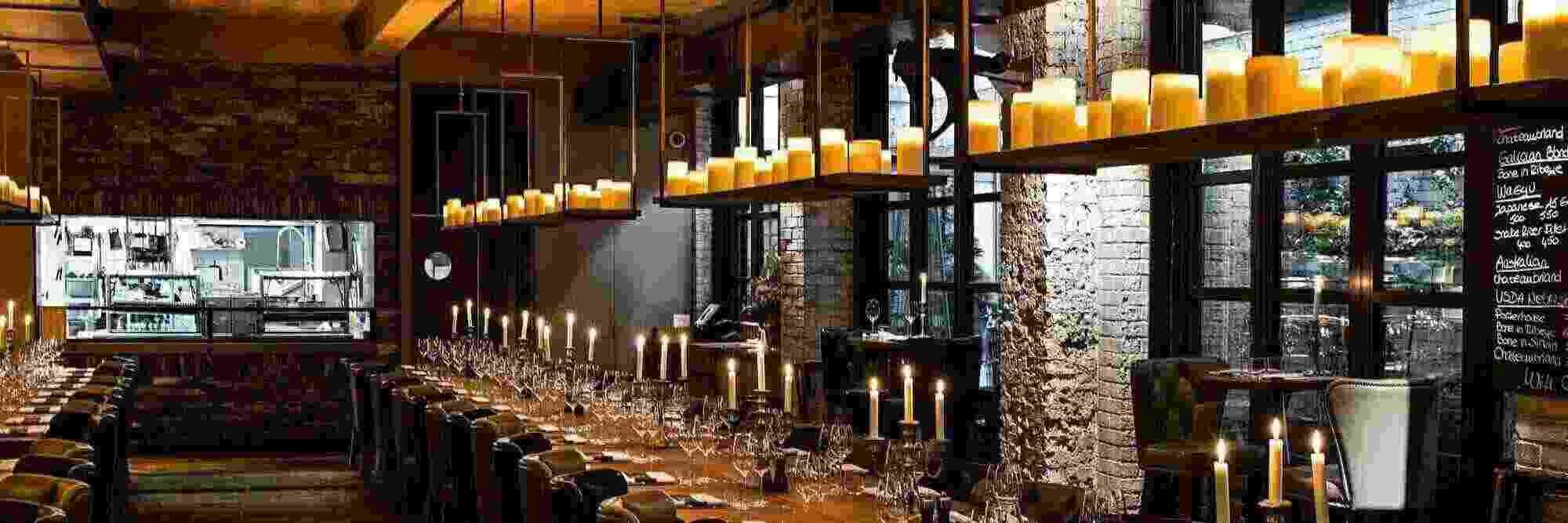 hanging shelves with candles above tables