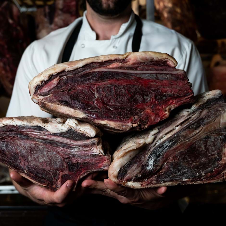 chef holding meat